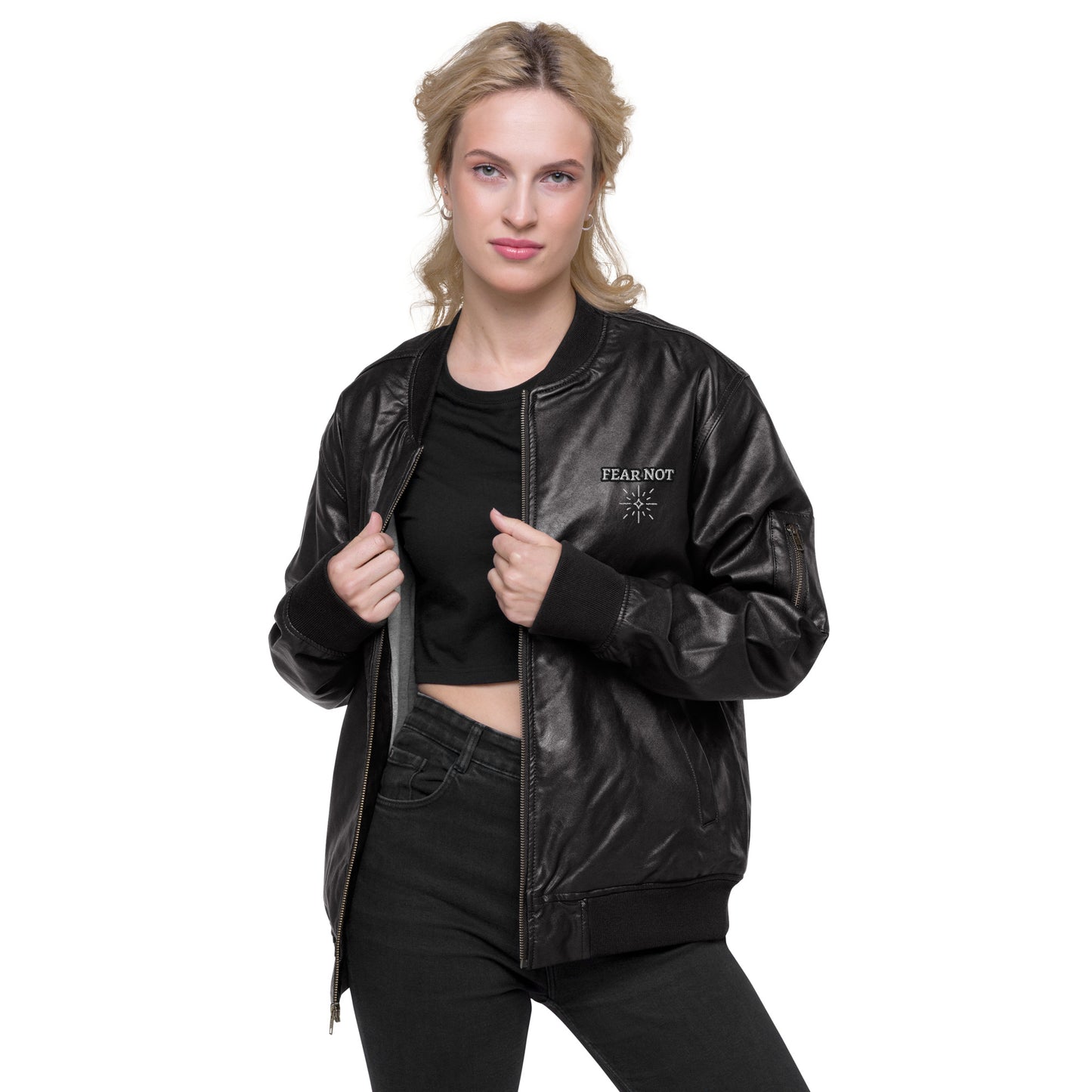 Model wearing black leather Christian bomber jacket with FEAR NOT and Psalm 118:6 embroidery