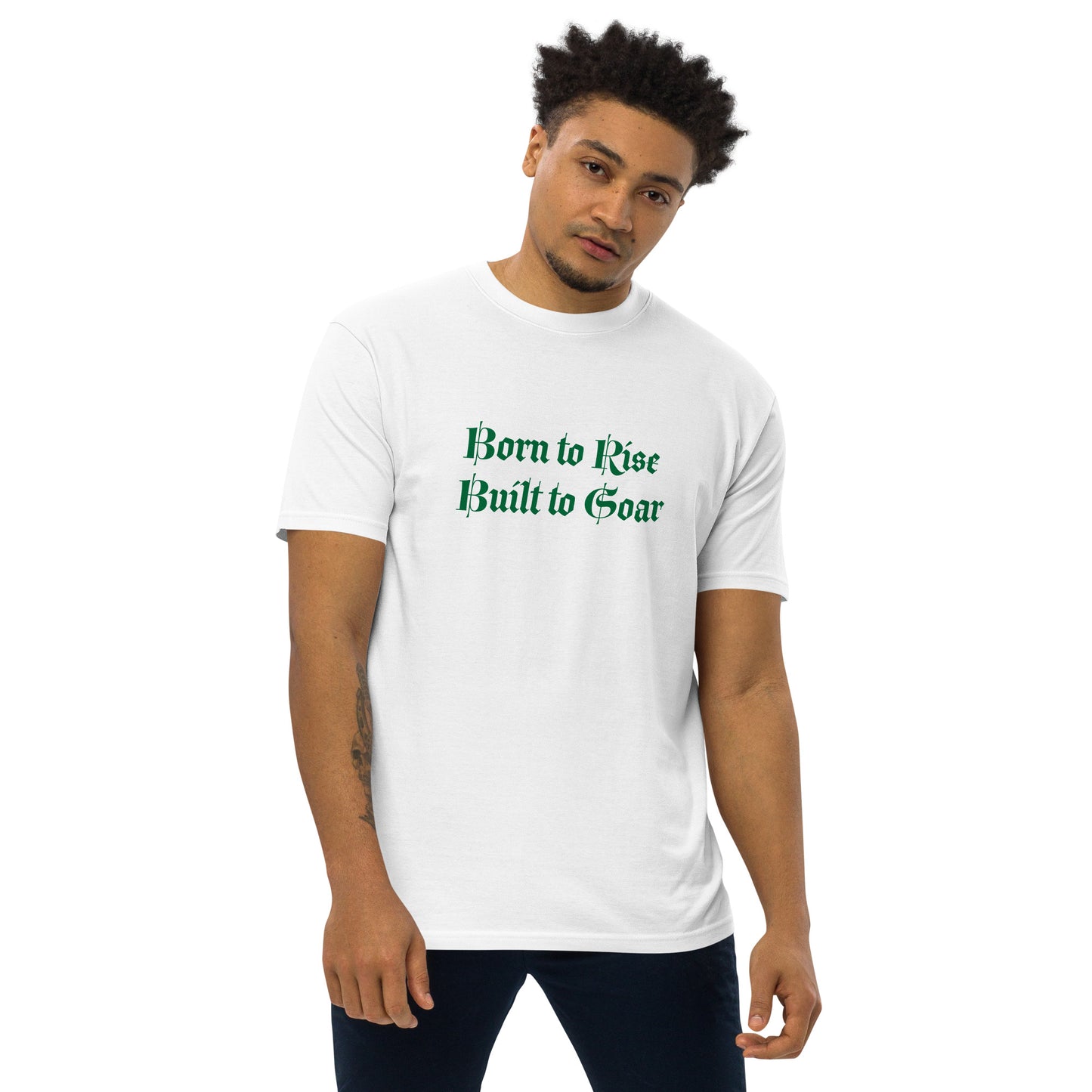 Man wearing white Built to Soar men’s t-shirt with motivational quote on front and wings printed on the back
