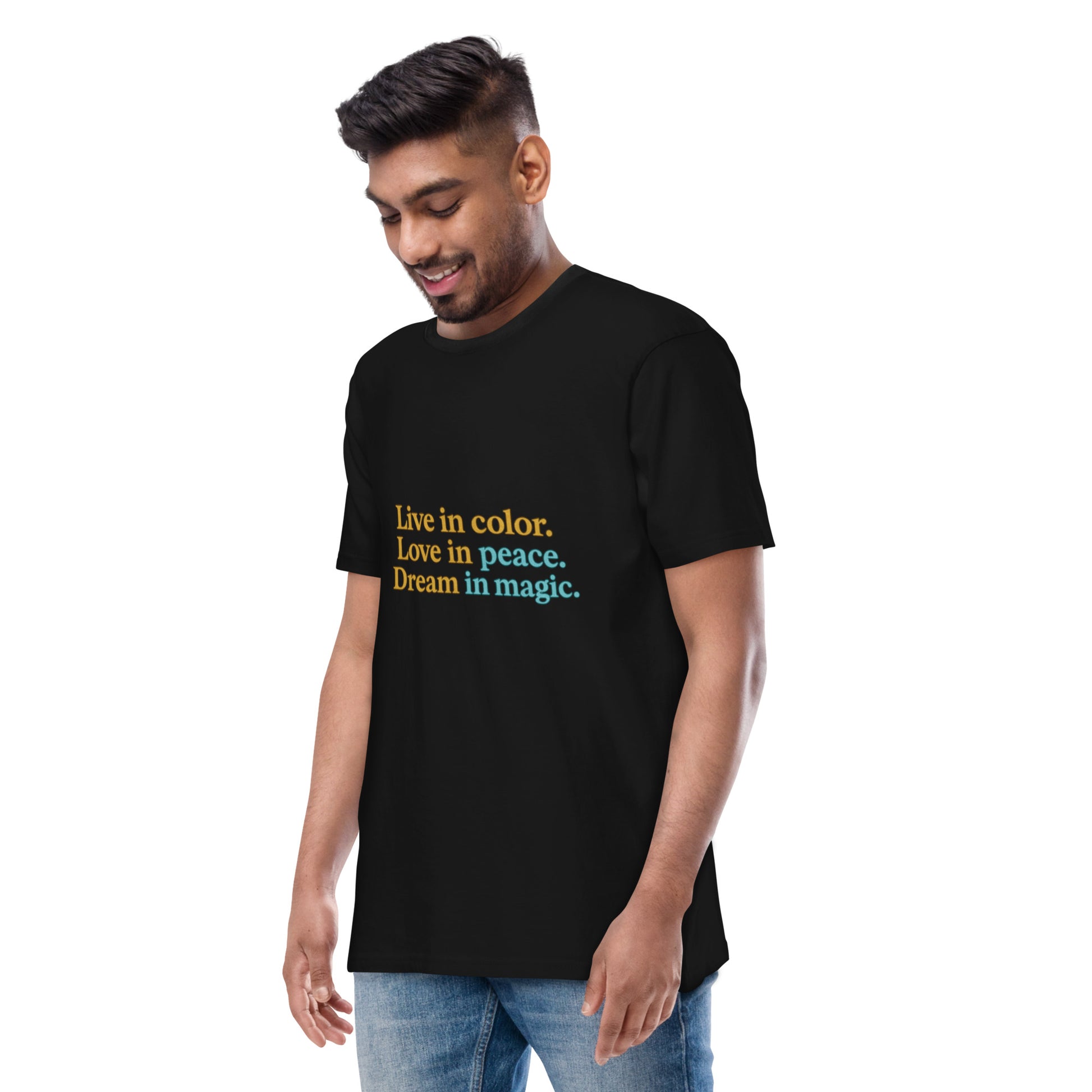 Man wearing black motivational tee with dreamcatcher print on the back
