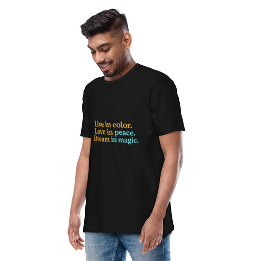 Man wearing black motivational tee with dreamcatcher print on the back
