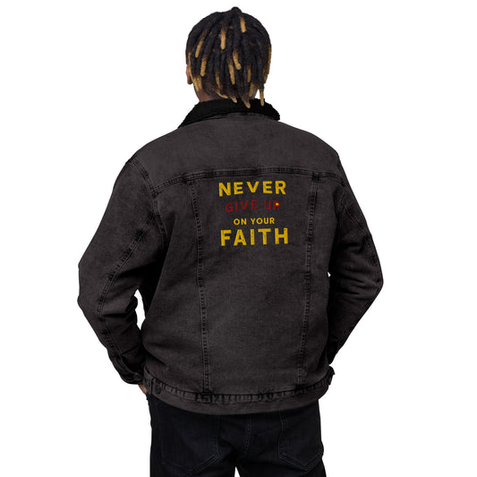 Back of Christian denim jacket with bold embroidery reading “Never Give Up On Your Faith” and cross 