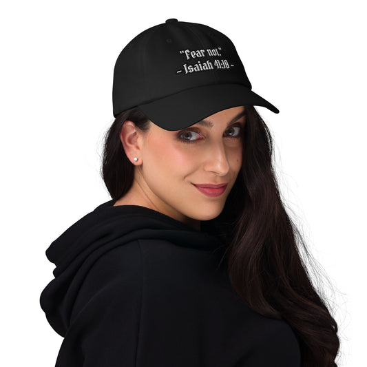 Woman wearing black embroidered Christian cap with “Fear Not – Isaiah 41:10”
