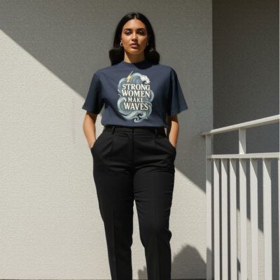Women’s oversized navy tee with “Strong Women Make Waves” design surrounded by lightning and waves