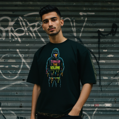Man wearing an oversized black rave tee with bold colorful graphic – music-inspired streetwear fashion